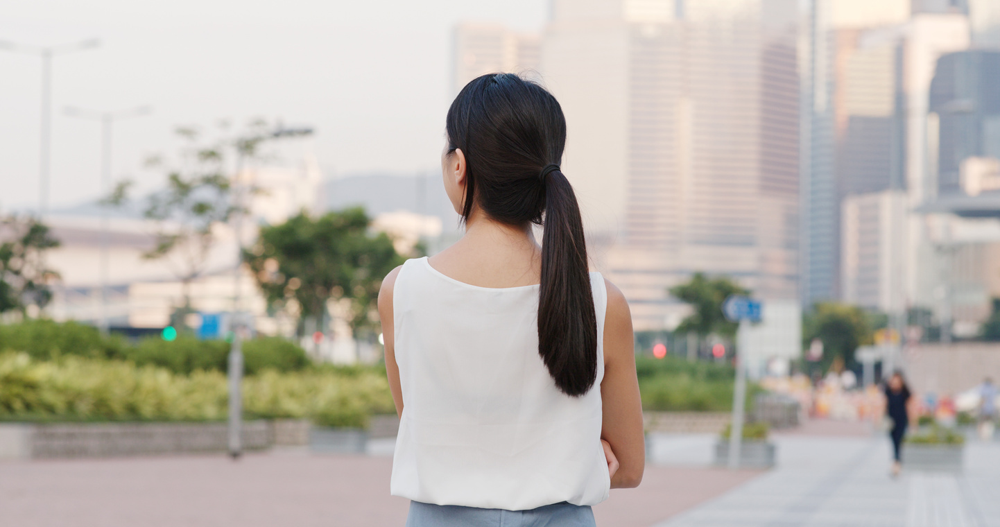 Back Rear View of Woman Look Far Away